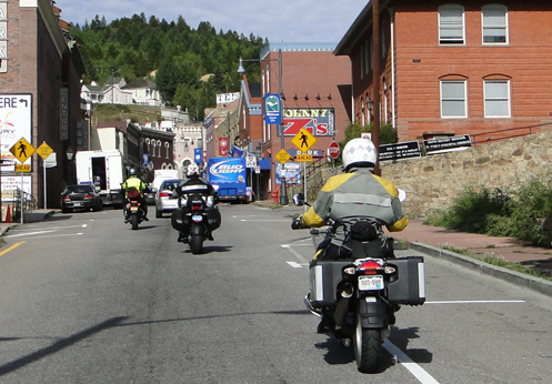 Motorcycles riding through Central City